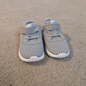Gray Nike infant shoes